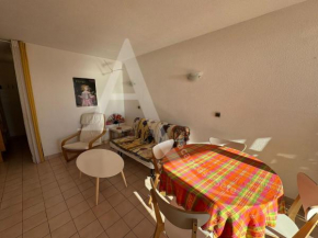 Studio cabine 4 personnes vue jardin dans residence avec piscine